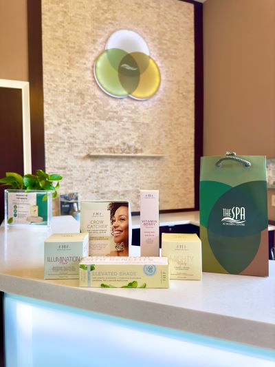 A brightly lit photo showing the front counter at The Spa at Rosen Centre with boxes of cosmetic products. Rosen Centre is the ultimate place to unwind in Orlando after a business meeting.